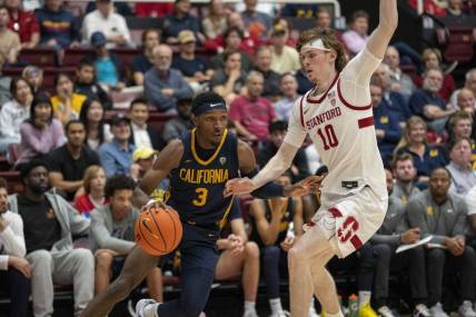 Mar 7, 2024; Stanford, California, USA; California Golden Bears guard Keonte Kennedy (3) dribbles the basketball against Stanford Cardinal forward Max Murrell (10) during the second half at Maples Pavillion. Mandatory Credit: Neville E. Guard-USA TODAY Sports