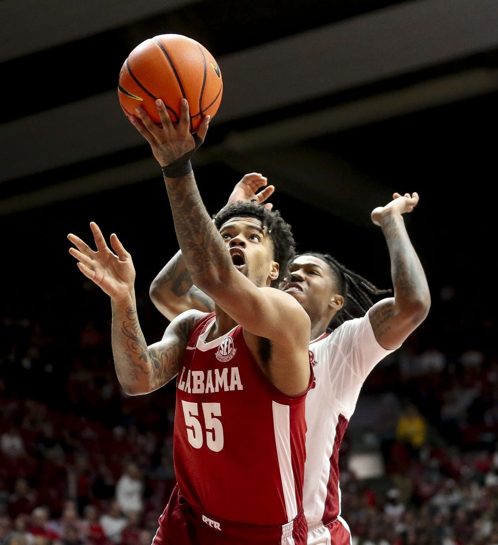 Mar 9, 2024; Tuscaloosa, Alabama, USA;  Alabama Crimson Tide guard Aaron Estrada goes to the hoop against Arkansas Razorbacks at Coleman Coliseum. Mandatory Credit: Gary Cosby Jr.-USA TODAY Sports