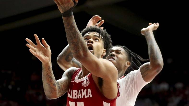 Mar 9, 2024; Tuscaloosa, Alabama, USA;  Alabama Crimson Tide guard Aaron Estrada goes to the hoop against Arkansas Razorbacks at Coleman Coliseum. Mandatory Credit: Gary Cosby Jr.-USA TODAY Sports