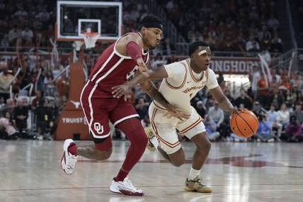 Mar 9, 2024; Austin, Texas, USA; Texas Longhorns guard Max Abmas (3) drives to the basket while defended by Oklahoma Sooners guard Rivaldo Soares (5) during the first half at Moody Center. Mandatory Credit: Scott Wachter-USA TODAY Sports