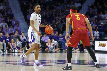 Mar 9, 2024; Manhattan, Kansas, USA; Kansas State Wildcats guard Tylor Perry (2) brings the ball up court against Iowa State Cyclones guard Tamin Lipsey (3) doing the first half at Bramlage Coliseum. Mandatory Credit: Scott Sewell-USA TODAY Sports