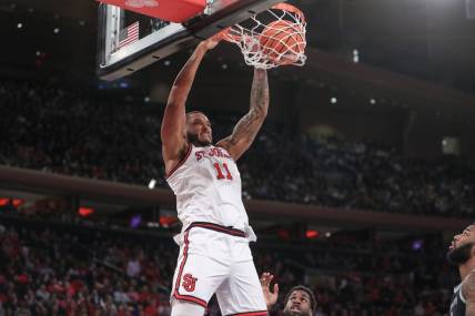 Mar 9, 2024; New York, New York, USA; St. John's Red Storm center Joel Soriano (11) dunks in the second half against the Georgetown Hoyas at Madison Square Garden. Mandatory Credit: Wendell Cruz-USA TODAY Sports