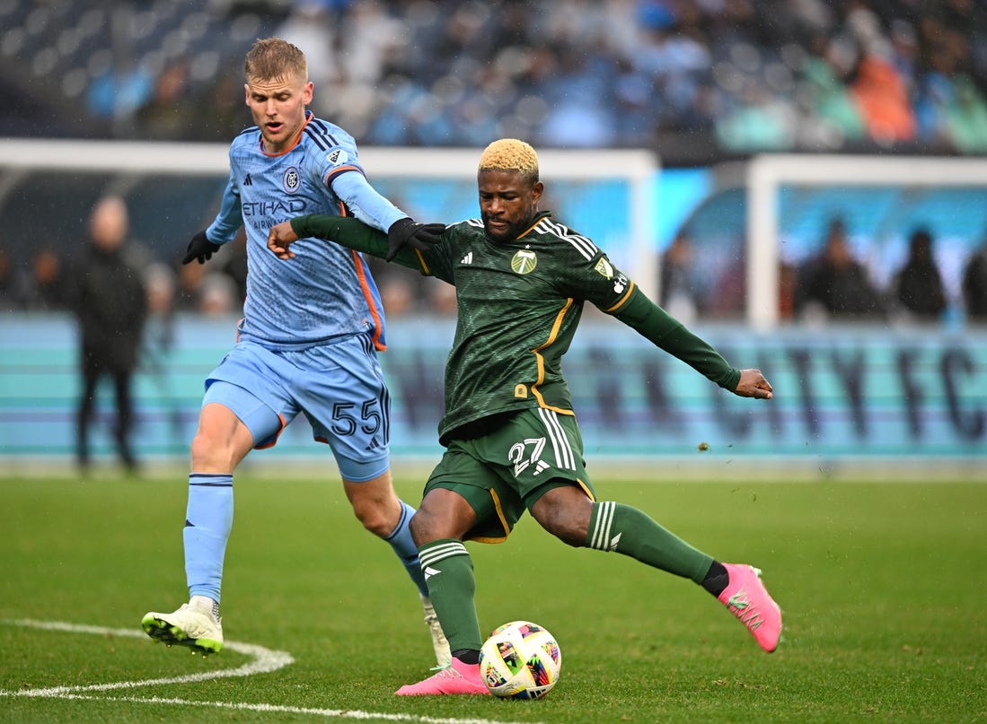 Mar 9, 2024; New York, New York, USA; Portland Timbers forward Dairon Asprilla (27) controls the ball New York City FC midfielder Keaton Parks (55) during the first half at Yankee Stadium. Mandatory Credit: Mark Smith-USA TODAY Sports