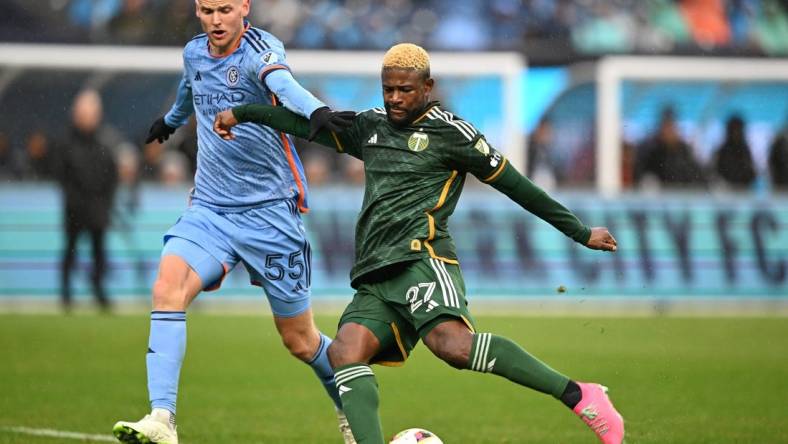 Mar 9, 2024; New York, New York, USA; Portland Timbers forward Dairon Asprilla (27) controls the ball New York City FC midfielder Keaton Parks (55) during the first half at Yankee Stadium. Mandatory Credit: Mark Smith-USA TODAY Sports