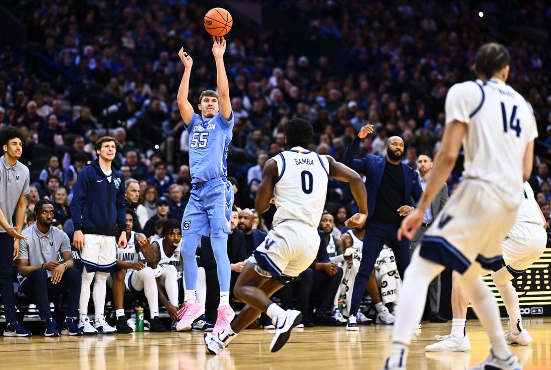 Mar 9, 2024; Philadelphia, Pennsylvania, USA; Creighton Bluejays guard Baylor Scheierman (55) shoots over Villanova Wildcats guard TJ Bamba (0) in the first half at Wells Fargo Center. Mandatory Credit: Kyle Ross-USA TODAY Sports