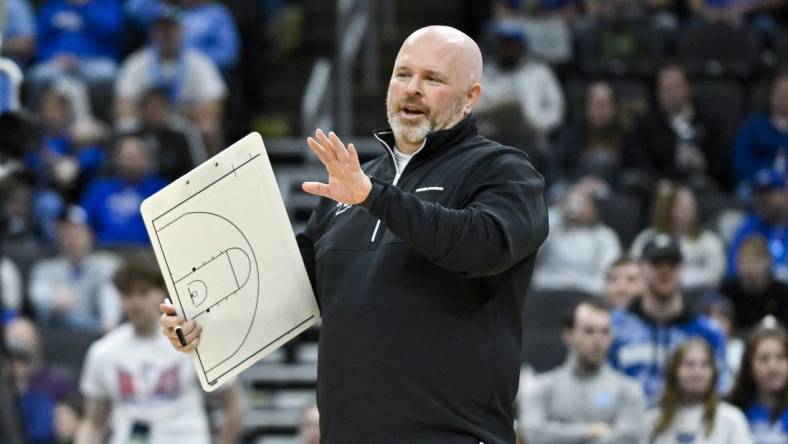 Mar 9, 2024; St. Louis, MO, USA;  Indiana State Sycamores head coach Josh Schertz looks on during a game against the Northern Iowa Panthers during the second half of the Missouri Valley Conference Tournament semifinal game at Enterprise Center. Mandatory Credit: Jeff Curry-USA TODAY Sports