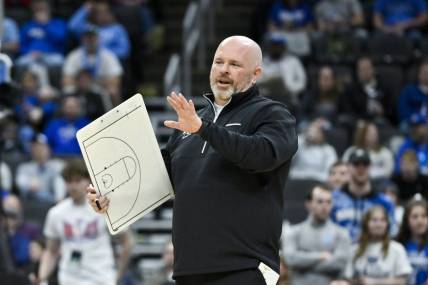 Mar 9, 2024; St. Louis, MO, USA;  Indiana State Sycamores head coach Josh Schertz looks on during a game against the Northern Iowa Panthers during the second half of the Missouri Valley Conference Tournament semifinal game at Enterprise Center. Mandatory Credit: Jeff Curry-USA TODAY Sports