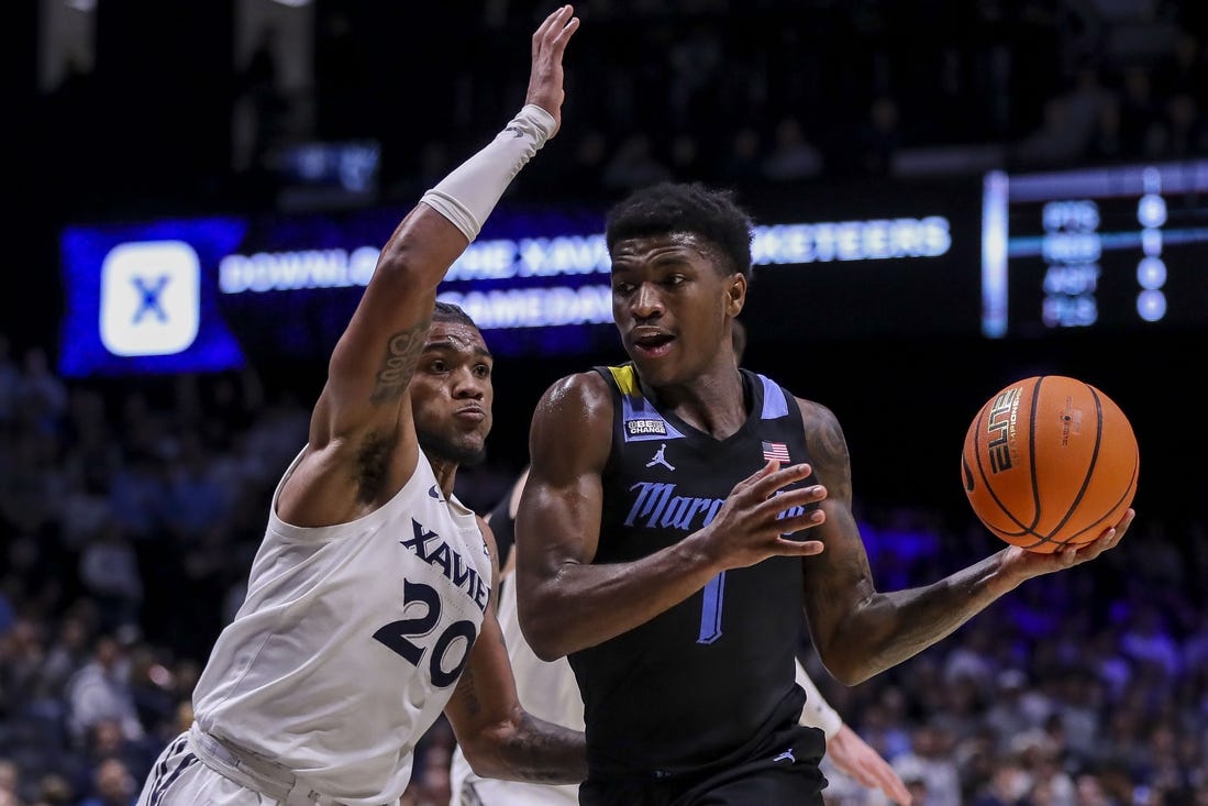 Mar 9, 2024; Cincinnati, Ohio, USA; Marquette Golden Eagles guard Kam Jones (1) dribbles against Xavier Musketeers guard Dayvion McKnight (20) in the first half at Cintas Center. Mandatory Credit: Katie Stratman-USA TODAY Sports