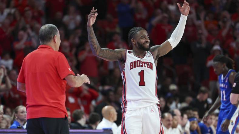 Mar 9, 2024; Houston, Texas, USA; Houston Cougars guard Jamal Shead (1) acknowledges the crowd after coming out of the game during the second half against the Kansas Jayhawks at Fertitta Center. Mandatory Credit: Troy Taormina-USA TODAY Sports