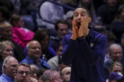 Mar 9, 2024; Cincinnati, Ohio, USA; Marquette Golden Eagles head coach Shaka Smart yells to his team during the second half against the Xavier Musketeers at Cintas Center. Mandatory Credit: Katie Stratman-USA TODAY Sports