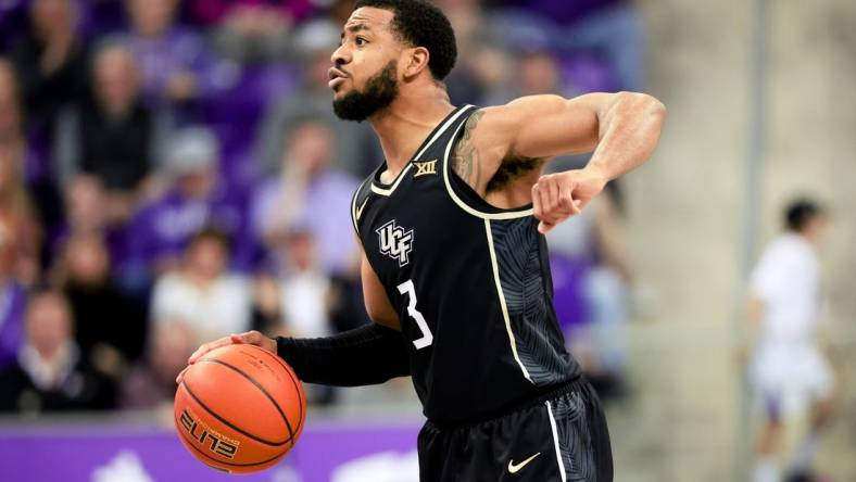 Mar 9, 2024; Fort Worth, Texas, USA;  UCF Knights guard Darius Johnson (3) reacts during the second half against the TCU Horned Frogs at Ed and Rae Schollmaier Arena. Mandatory Credit: Kevin Jairaj-USA TODAY Sports