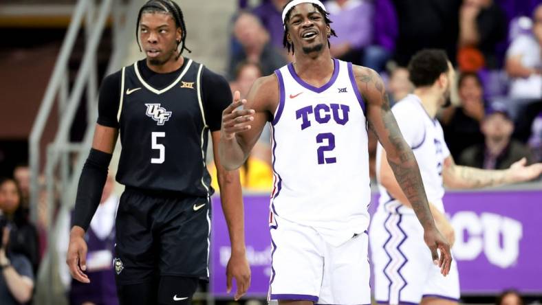 Mar 9, 2024; Fort Worth, Texas, USA; TCU Horned Frogs forward Emanuel Miller (2) reacts in front of UCF Knights forward Omar Payne (5) during the second half at Ed and Rae Schollmaier Arena. Mandatory Credit: Kevin Jairaj-USA TODAY Sports