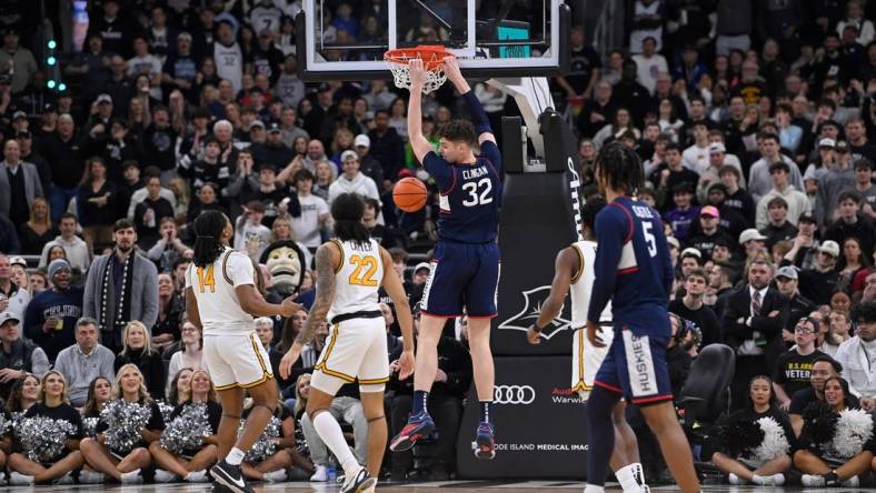 Mar 9, 2024; Providence, Rhode Island, USA: Connecticut Huskies center Donovan Clingan (32) makes a basket against the Providence Friars during the first half at Amica Mutual Pavilion. Mandatory Credit: Eric Canha-USA TODAY Sports