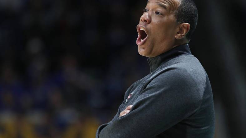 Mar 9, 2024; Pittsburgh, Pennsylvania, USA;  North Carolina State Wolfpack head coach Kevin Keatts reacts on the sidelines against the Pittsburgh Panthers during the first half at the Petersen Events Center. Mandatory Credit: Charles LeClaire-USA TODAY Sports