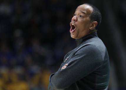 Mar 9, 2024; Pittsburgh, Pennsylvania, USA;  North Carolina State Wolfpack head coach Kevin Keatts reacts on the sidelines against the Pittsburgh Panthers during the first half at the Petersen Events Center. Mandatory Credit: Charles LeClaire-USA TODAY Sports