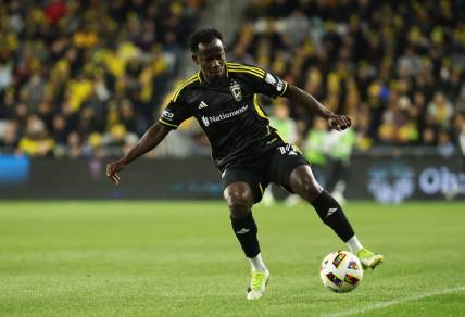 Mar 9, 2024; Columbus, Ohio, USA; Columbus Crew midfielder Yaw Yeboah (14) controls the ball against against the Chicago Fire FC in the first half  at Lower.com Field. Mandatory Credit: Trevor Ruszkowski-USA TODAY Sports
