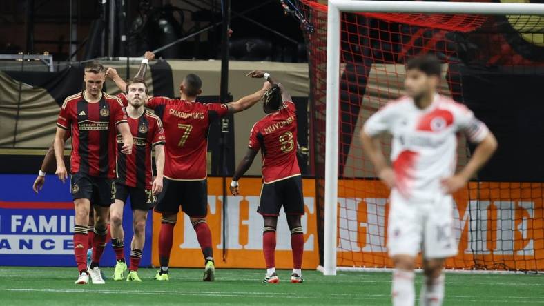 Mar 9, 2024; Atlanta, Georgia, USA;  Atlanta United forward Giorgos Giakoumakis (7) celebrates his goal against the New England Revolution in the second half at Mercedes-Benz Stadium. Mandatory Credit: Brett Davis-USA TODAY Sports