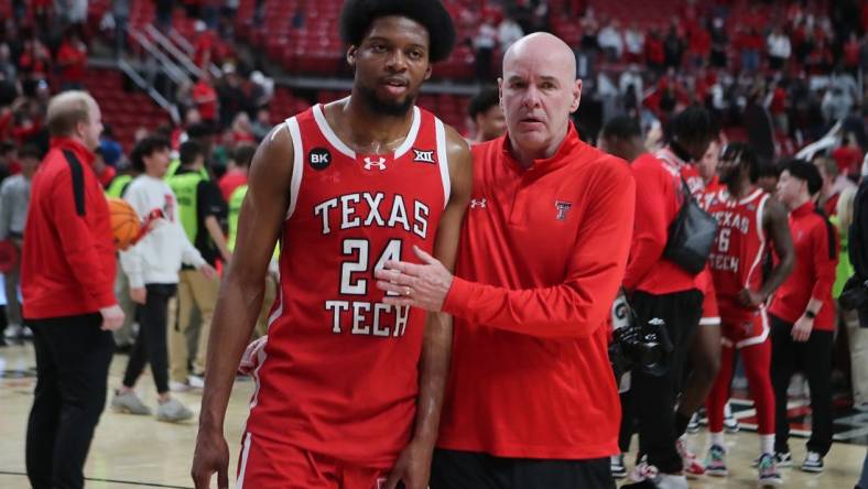 Mar 9, 2024; Lubbock, Texas, USA;  Texas Tech Red Raiders guard Kerwin Walton (24) with assistant coach Dave Smart after the game against the Baylor Bears at United Supermarkets Arena. Mandatory Credit: Michael C. Johnson-USA TODAY Sports