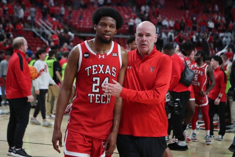 Mar 9, 2024; Lubbock, Texas, USA;  Texas Tech Red Raiders guard Kerwin Walton (24) with assistant coach Dave Smart after the game against the Baylor Bears at United Supermarkets Arena. Mandatory Credit: Michael C. Johnson-USA TODAY Sports