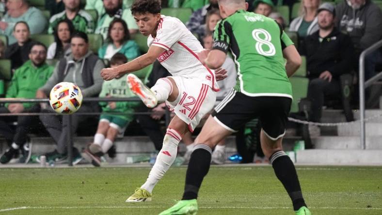 Mar 9, 2024; Austin, Texas, USA; St. Louis CITY SC midfielder Celio Pompeu (12) plays the ball against Austin FC midfielder Alex Ring (8) during the second half at Q2 Stadium. Mandatory Credit: Scott Wachter-USA TODAY Sports