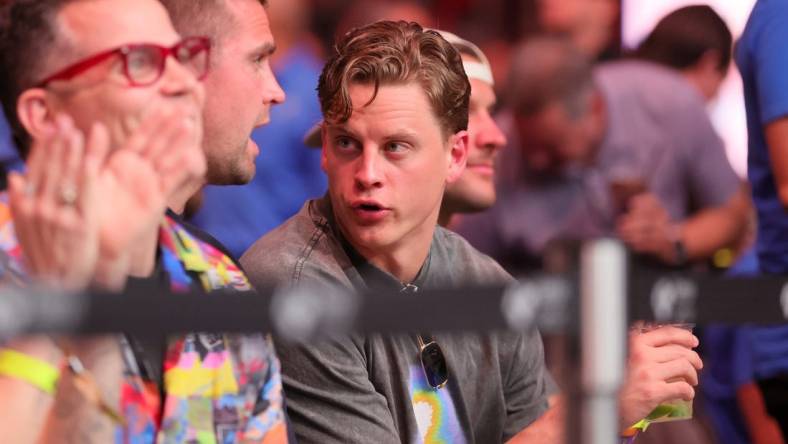 Mar 9, 2024; Miami, Florida, USA; Cincinnati Bengals quarterback Joe Burrow watches the fight between Jack Della Maddalena and Gilbert Burns during UFC 299 at Kayesa Center. Mandatory Credit: Sam Navarro-USA TODAY Sports