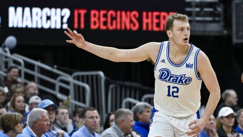 Mar 10, 2024; St. Louis, MO, USA;  Drake Bulldogs guard Tucker DeVries (12) reacts after making a three pointer against the Indiana State Sycamores during the first half of the Missouri Valley Conference Tournament Championship game at Enterprise Center. Mandatory Credit: Jeff Curry-USA TODAY Sports