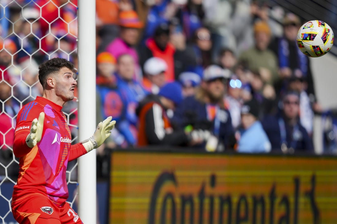 Mar 10, 2024; Cincinnati, Ohio, USA;  D.C. United goalkeeper Alex Bono (24) makes a save in net against FC Cincinnati in the first half at TQL Stadium. Mandatory Credit: Aaron Doster-USA TODAY Sports