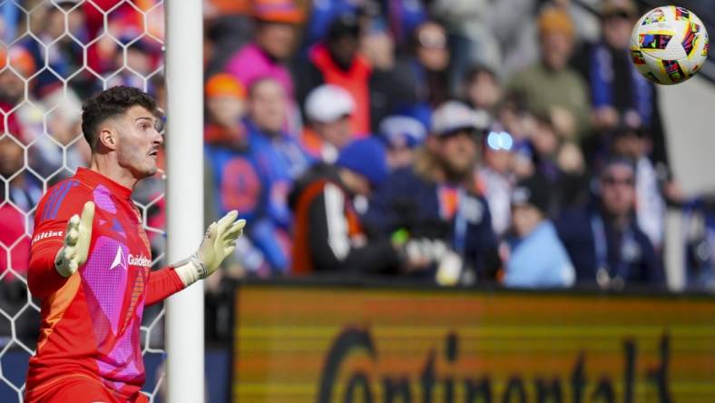 Mar 10, 2024; Cincinnati, Ohio, USA;  D.C. United goalkeeper Alex Bono (24) makes a save in net against FC Cincinnati in the first half at TQL Stadium. Mandatory Credit: Aaron Doster-USA TODAY Sports