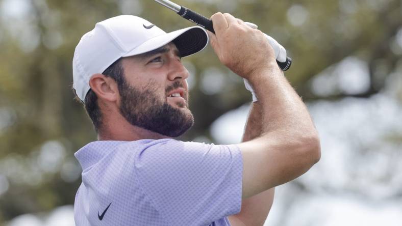 Mar 10, 2024; Orlando, Florida, USA;   Scottie Scheffler plays his shot from the seventh tee during the final round of the Arnold Palmer Invitational golf tournament. Mandatory Credit: Reinhold Matay-USA TODAY Sports