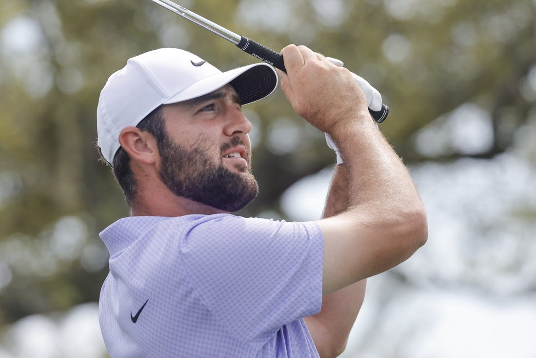 Mar 10, 2024; Orlando, Florida, USA;   Scottie Scheffler plays his shot from the seventh tee during the final round of the Arnold Palmer Invitational golf tournament. Mandatory Credit: Reinhold Matay-USA TODAY Sports