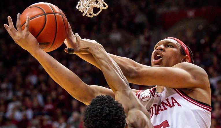 Indiana's Malik Reneau (5) is fouled by Michigan State's Tyson Walker (2) during the first half of the Indiana versus Michigan State men's basketball game at Simon Skjodt Assembly Hall on Sunday, March 10, 2024.