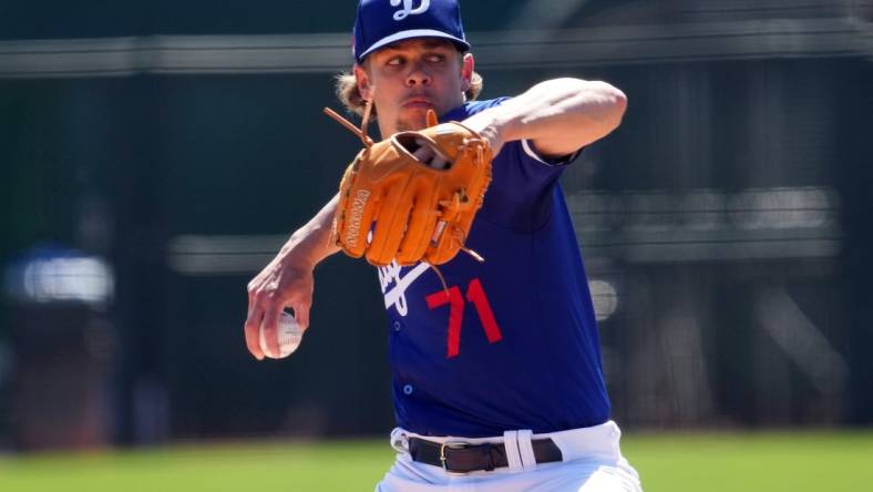 Mar 10, 2024; Phoenix, Arizona, USA; Los Angeles Dodgers starting pitcher Gavin Stone (71) pitches against the Arizona Diamondbacks during the first inning at Camelback Ranch-Glendale. Mandatory Credit: Joe Camporeale-USA TODAY Sports