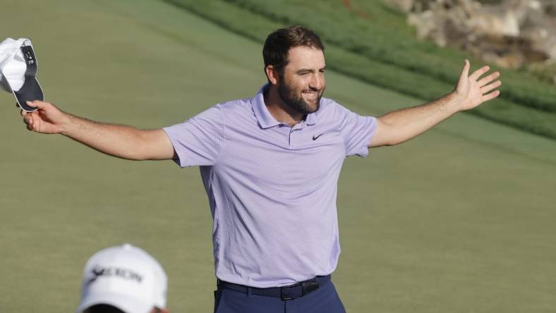 Mar 10, 2024; Orlando, Florida, USA;  Scottie Scheffler celebrates after he won the Arnold Palmer Invitational golf tournament. Mandatory Credit: Reinhold Matay-USA TODAY Sports