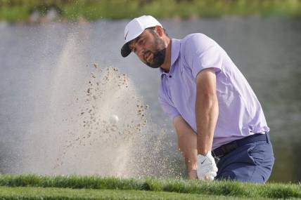 Mar 10, 2024; Orlando, Florida, USA;  Scottie Scheffler hits from the bunker on the 17th hole during the final round of the Arnold Palmer Invitational golf tournament. Mandatory Credit: Reinhold Matay-USA TODAY Sports