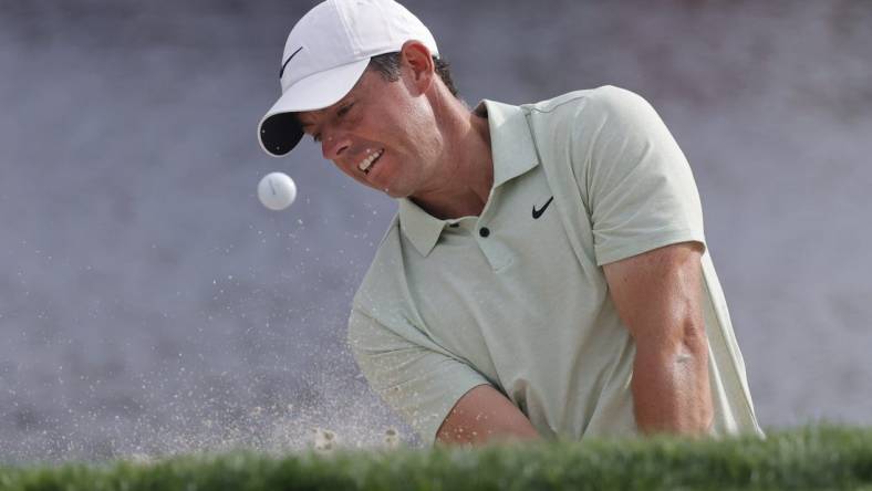 Mar 10, 2024; Orlando, Florida, USA;  Rory McIlroy hits from the bunker on the 17th green during the final round of the Arnold Palmer Invitational golf tournament. Mandatory Credit: Reinhold Matay-USA TODAY Sports