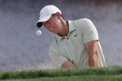 Mar 10, 2024; Orlando, Florida, USA;  Rory McIlroy hits from the bunker on the 17th green during the final round of the Arnold Palmer Invitational golf tournament. Mandatory Credit: Reinhold Matay-USA TODAY Sports