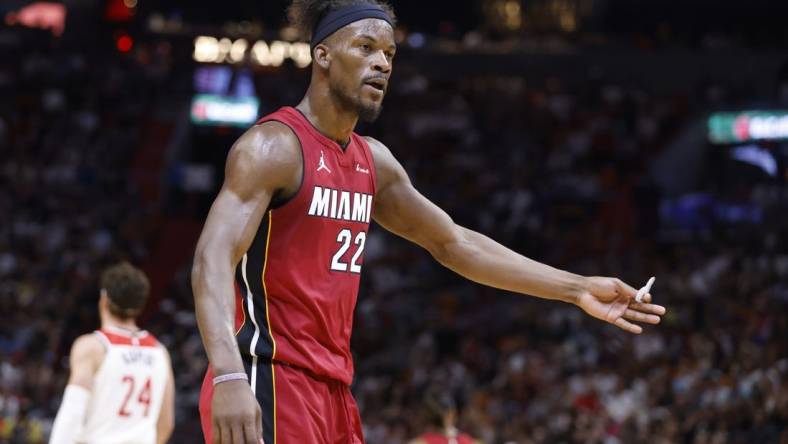 Mar 10, 2024; Miami, Florida, USA; Miami Heat forward Jimmy Butler (22) argues a call against the Washington Wizards in the first half at Kaseya Center. Mandatory Credit: Rhona Wise-USA TODAY Sports