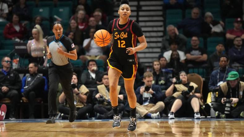 Mar 10, 2024; Las Vegas, NV, USA; Southern California Trojans guard JuJu Watkins (12) dribbles the ball against the Stanford Cardinal in the second half of the Pac-12 Tournament women's championship game at MGM Grand Garden Arena. Mandatory Credit: Kirby Lee-USA TODAY Sports