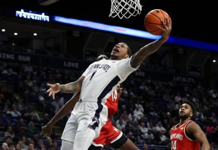 Mar 10, 2024; University Park, Pennsylvania, USA; Penn State Nittany Lions guard Ace Baldwin Jr (1) drives the ball to the basket during the first half against the Maryland Terrapins at Bryce Jordan Center. Mandatory Credit: Matthew O'Haren-USA TODAY Sports