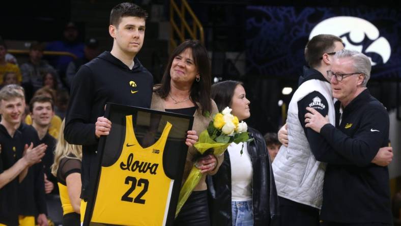 Iowa   s Patrick McCaffery, left, is pictured with his family during senior recognition Sunday, March 10, 2024 at Carver-Hawkeye Arena in Iowa City, Iowa.