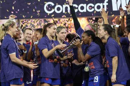 Mar 10, 2024; San Diego, California, USA;  Team USA celebrate the gold medal and trophy presentation after the win over Brazil during the final of the 2024 W Gold Cup at Snapdragon Stadium. Mandatory Credit: Abe Arredondo-USA TODAY Sports