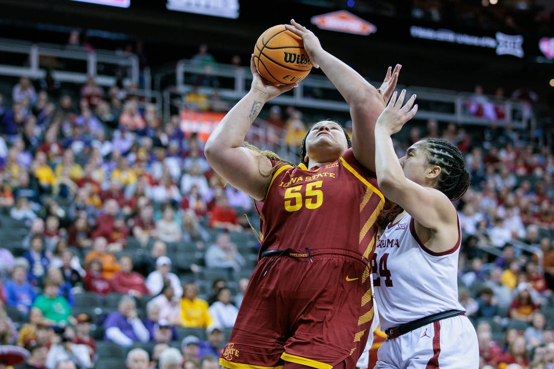 Mar 11, 2024; Kansas City, MO, USA; Iowa State Cyclones center Audi Crooks (55) shoots the ball around Oklahoma Sooners forward Skylar Vann (24) during the second half at T-Mobile Center. Mandatory Credit: William Purnell-USA TODAY Sports