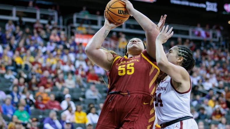 Mar 11, 2024; Kansas City, MO, USA; Iowa State Cyclones center Audi Crooks (55) shoots the ball around Oklahoma Sooners forward Skylar Vann (24) during the second half at T-Mobile Center. Mandatory Credit: William Purnell-USA TODAY Sports