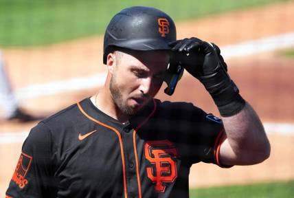 Mar 11, 2024; Surprise, Arizona, USA; San Francisco Giants designated hitter Joey Bart (21) reacts after striking out against the Kansas City Royals during the second inning at Surprise Stadium. Mandatory Credit: Joe Camporeale-USA TODAY Sports