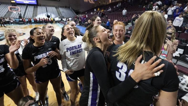 March 11, 2024; Las Vegas, NV, USA; Portland Pilots forward Kennedy Dickie (12) celebrates with forward Lucy Cochrane (30) against the Santa Clara Broncos after the game in the semifinals of the WCC Basketball Championship at Orleans Arena. Mandatory Credit: Kyle Terada-USA TODAY Sports