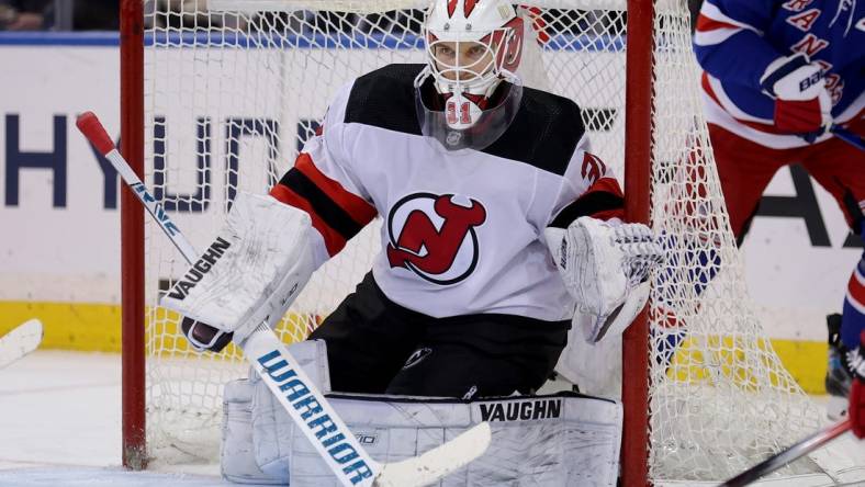 Mar 11, 2024; New York, New York, USA; New Jersey Devils goaltender Kaapo Kahkonen (31) tends net against the New York Rangers during the third period at Madison Square Garden. Mandatory Credit: Brad Penner-USA TODAY Sports