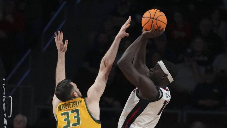 March 11, 2024; Las Vegas, NV, USA; Gonzaga Bulldogs forward Graham Ike (13) shoots the basketball against San Francisco Dons center Volodymyr Markovetskyy (33) during the first half in the semifinals of the WCC Basketball Championship at Orleans Arena. Mandatory Credit: Kyle Terada-USA TODAY Sports