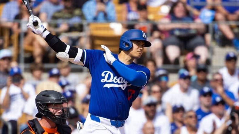 Mar 12, 2024; Phoenix, Arizona, USA; Los Angeles Dodgers designated hitter Shohei Ohtani against the San Francisco Giants during a spring training baseball game at Camelback Ranch-Glendale. Mandatory Credit: Mark J. Rebilas-USA TODAY Sports