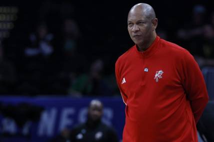 Mar 12, 2024; Washington, D.C., USA; Louisville Cardinals head coach Kenny Payne looks on from the bench against the North Carolina State Wolfpack in the second half at Capital One Arena. Mandatory Credit: Geoff Burke-USA TODAY Sports
