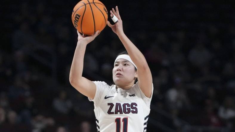 March 12, 2024; Las Vegas, NV, USA; Gonzaga Bulldogs guard Kayleigh Truong (11) shoots the basketball against the Portland Pilots during the second half in the finals of the WCC Basketball Championship at Orleans Arena. Mandatory Credit: Kyle Terada-USA TODAY Sports